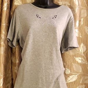 Ladies jeweled butterfly t-shirt. Soft well made and split hemline.